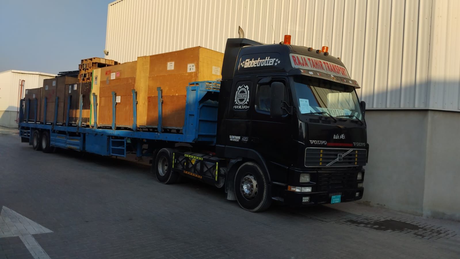 Raja and Tahir Transport truck loaded with industrial cargo in Dubai